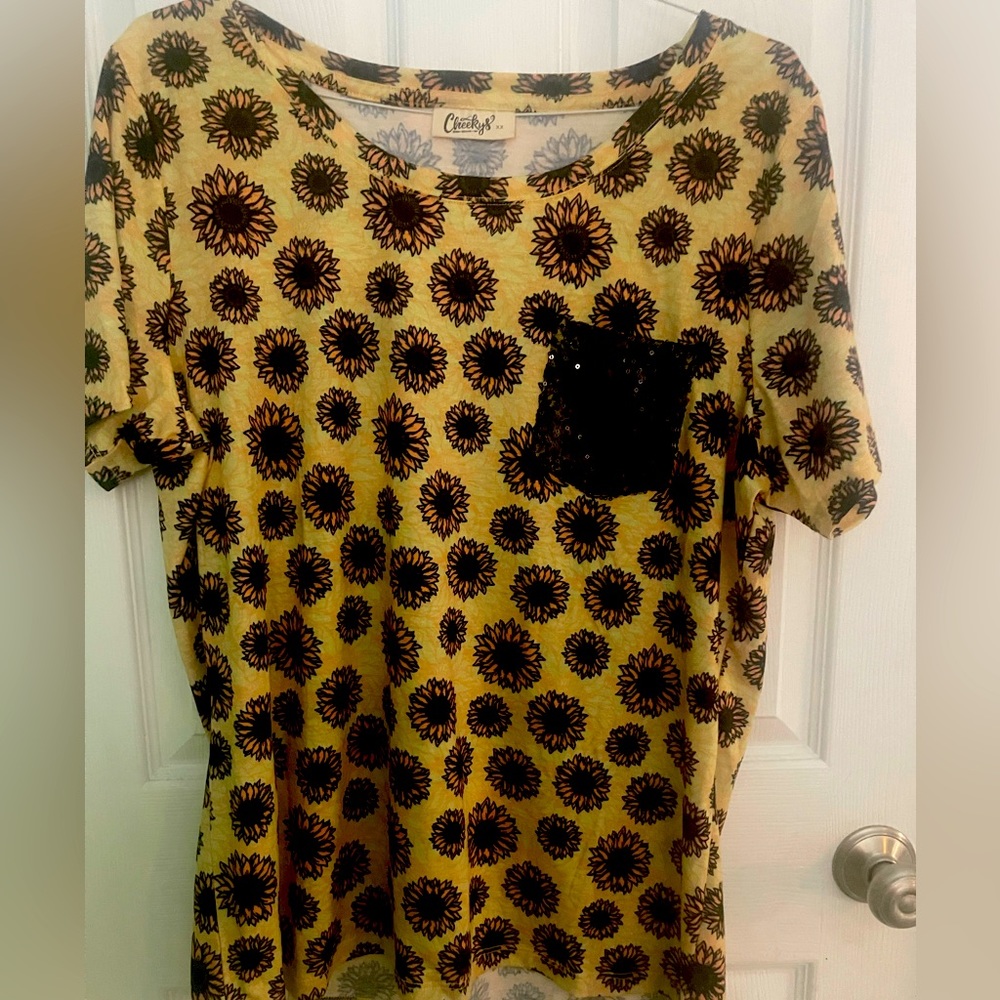 Never worn from Cheekys Boutique.   Size 2x